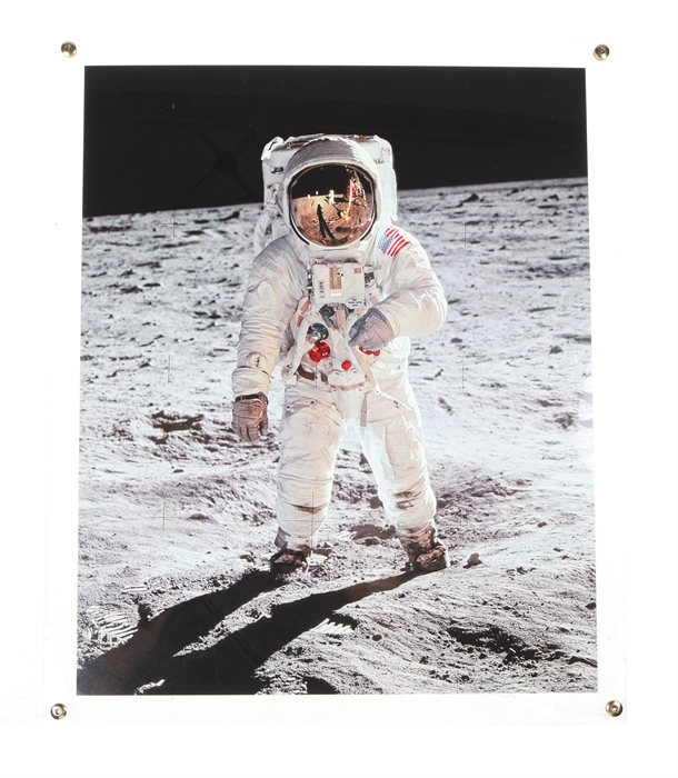 Moonfire: The Epic Journey of Apollo 11 (+) Color photograph of the famous "visor" photo of Buzz Aldrin on the moon.